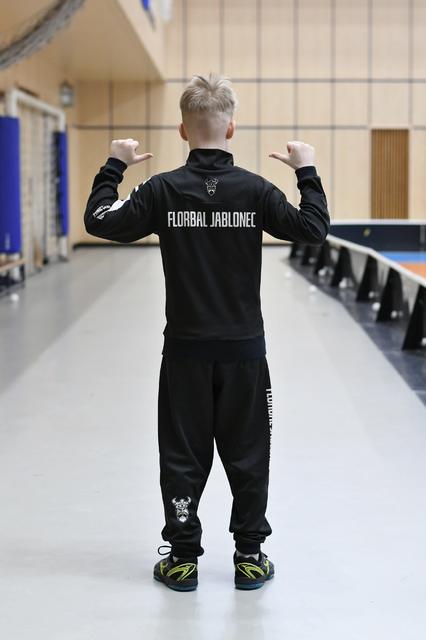 souprava záda a tepláky